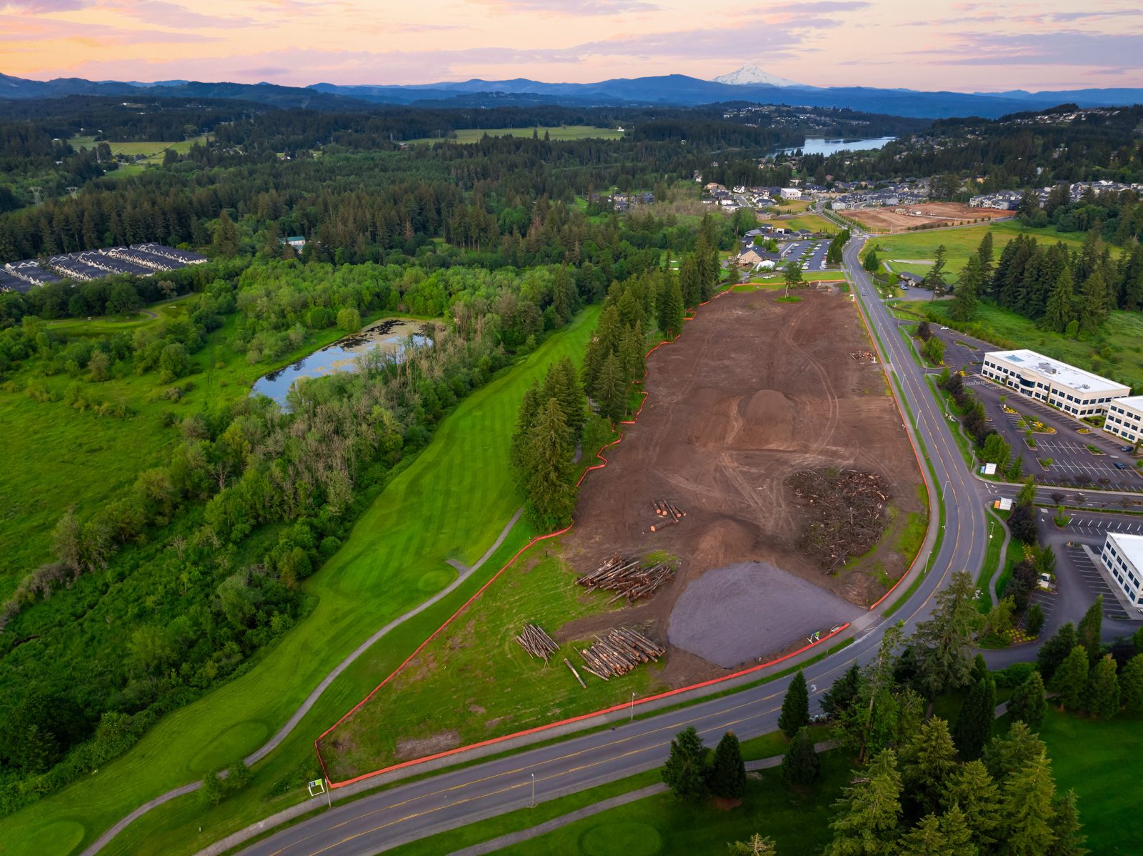Aerial view of The Nines site cleared for grading beside the Camas Meadows golf course